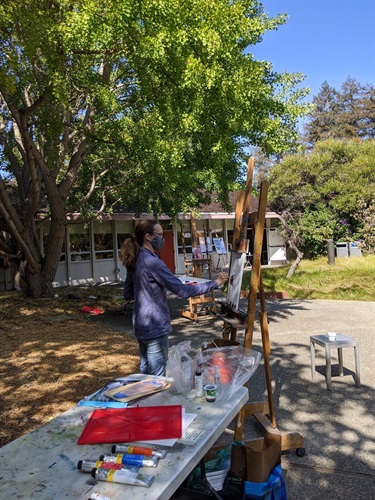 Students in the Art Center outdoor painting studio