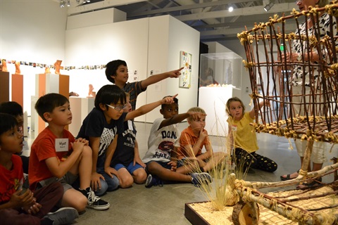 Kids looking at art