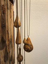 Ball chain, eye hooks, twine, found iron spout, wood (cherry, pecan, walnut, elm, and maple)