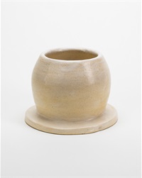Wheel-thrown almost spherical ceramic centerpiece with flat top made from a stoneware clay