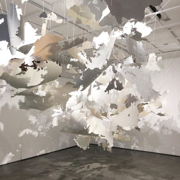 paper hanging installation by Val Britton