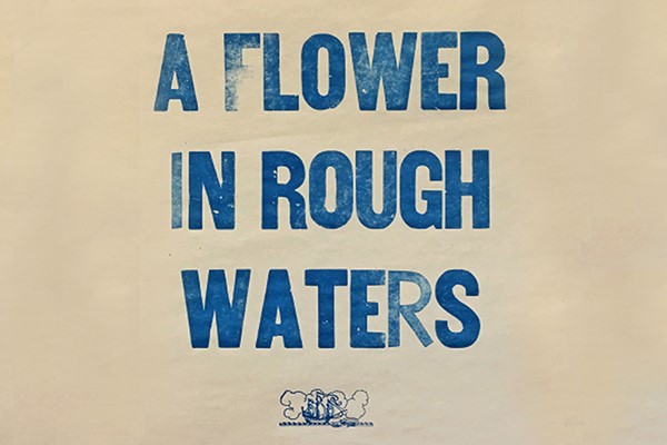 A Flower In Rough Waters